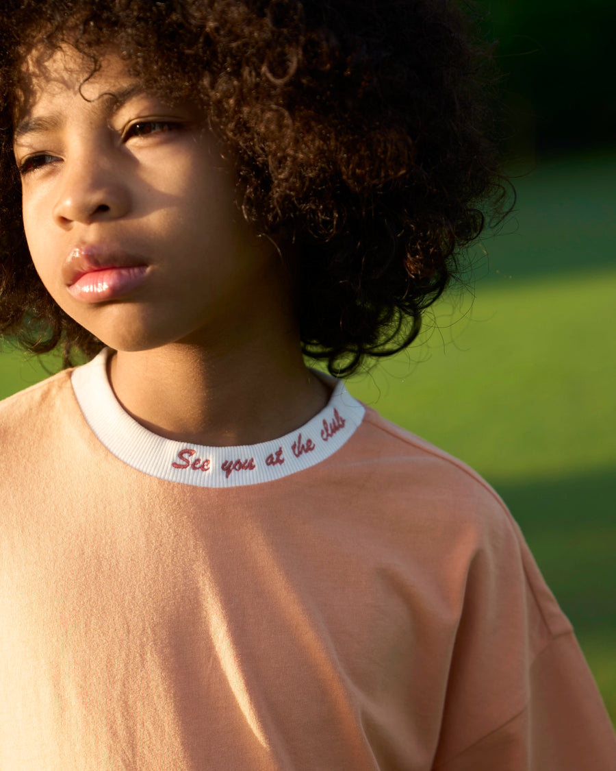 The Club Tee