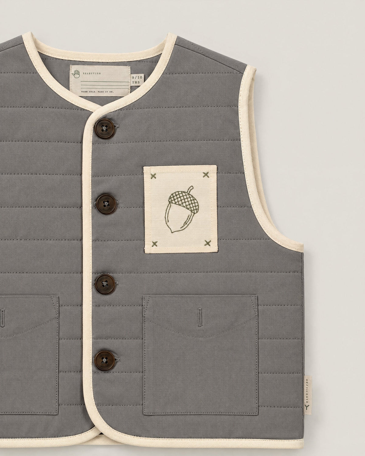 The Block Gilet in Pewter — acorn patch and quilting detail