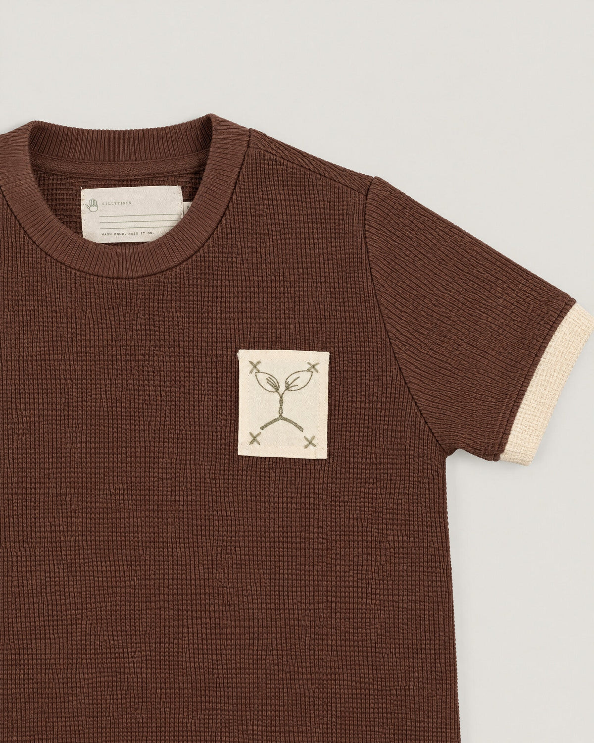 The Block Tee in Bark — waffle knit and name tape detail
