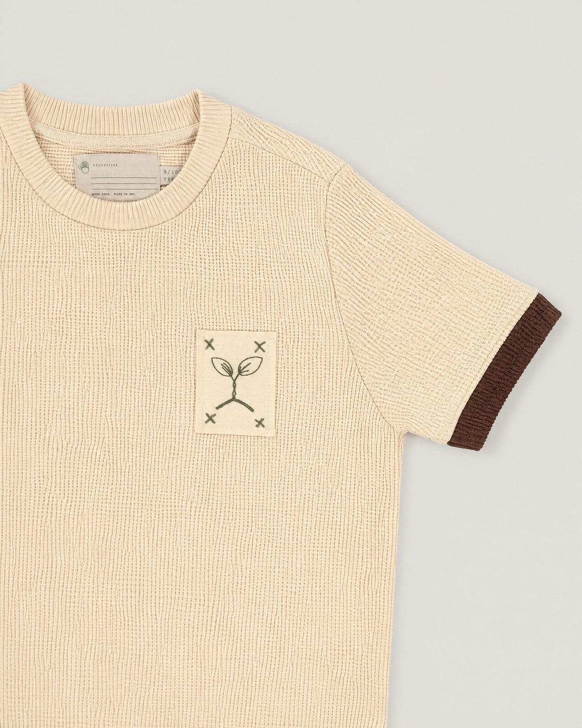 The Block Tee in Maple — waffle knit and name tape detail