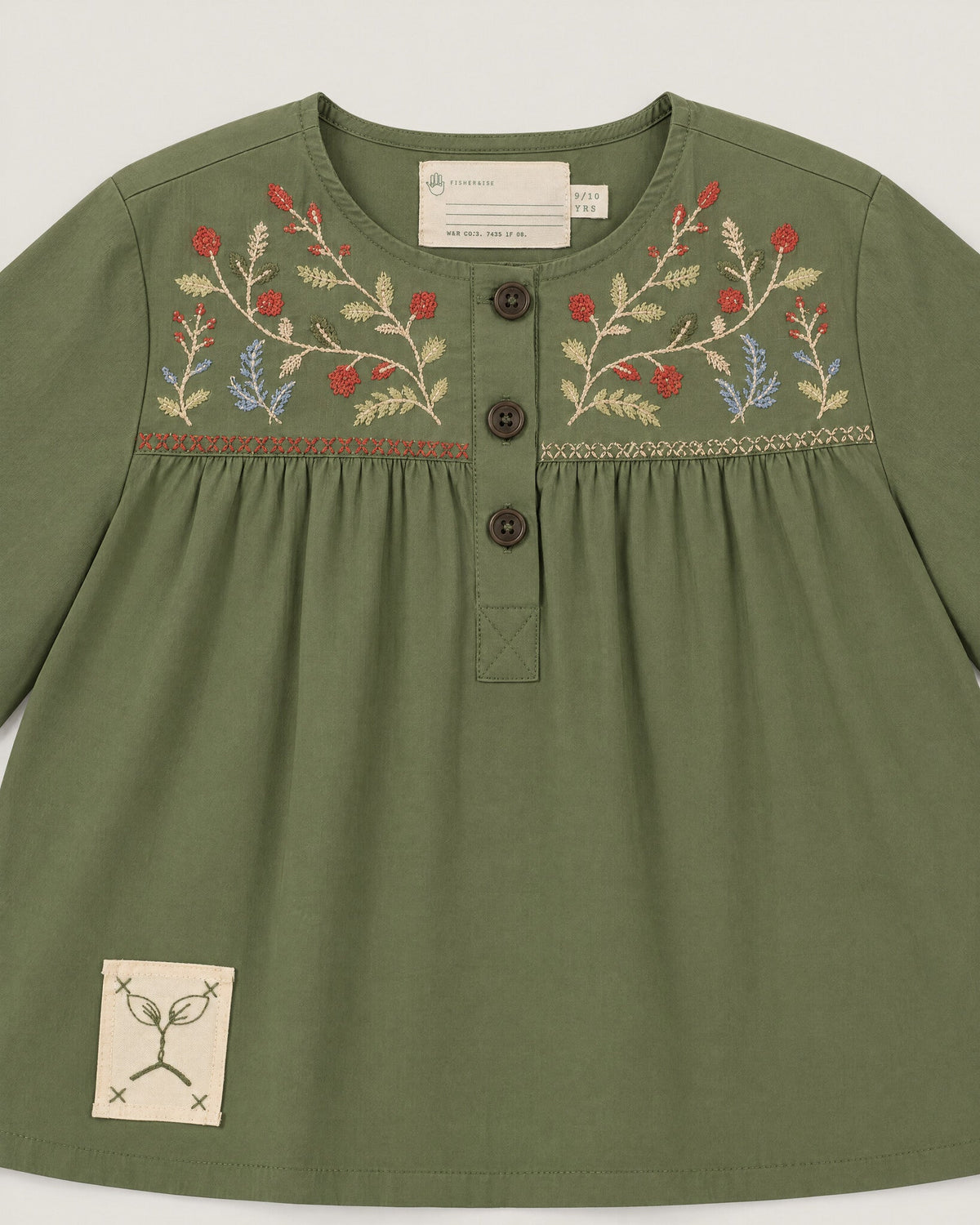 The Garden Blouse in Moss — embroidered yoke detail