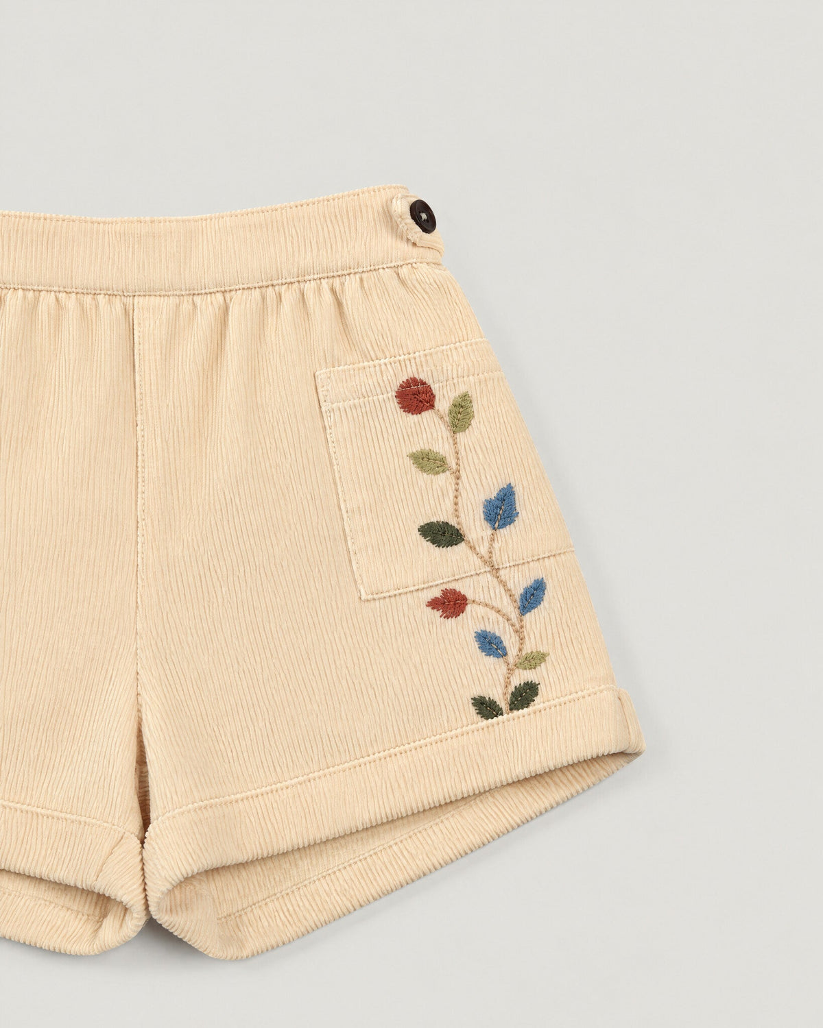 The Garden Shorts in Maple — embroidered pocket detail