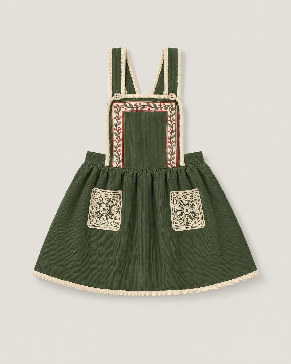 The Gift Pinafore in Moss — front