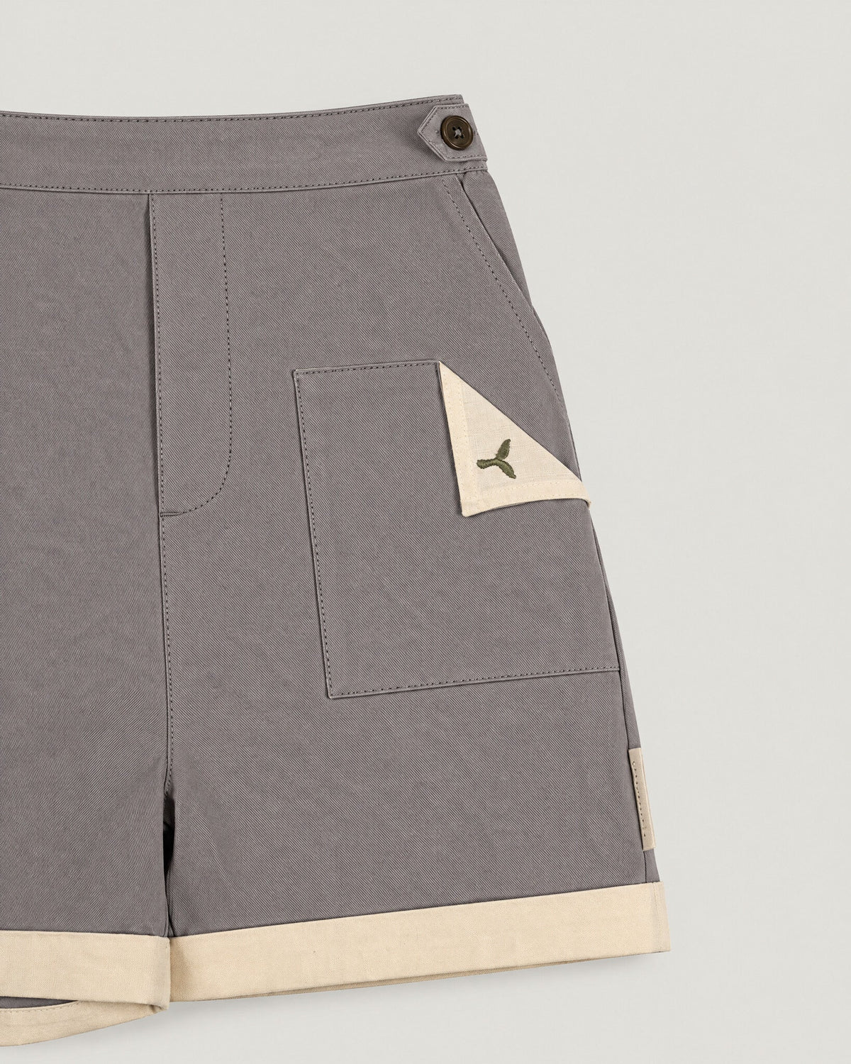 The Grid Shorts in Pewter — turn-back hem detail